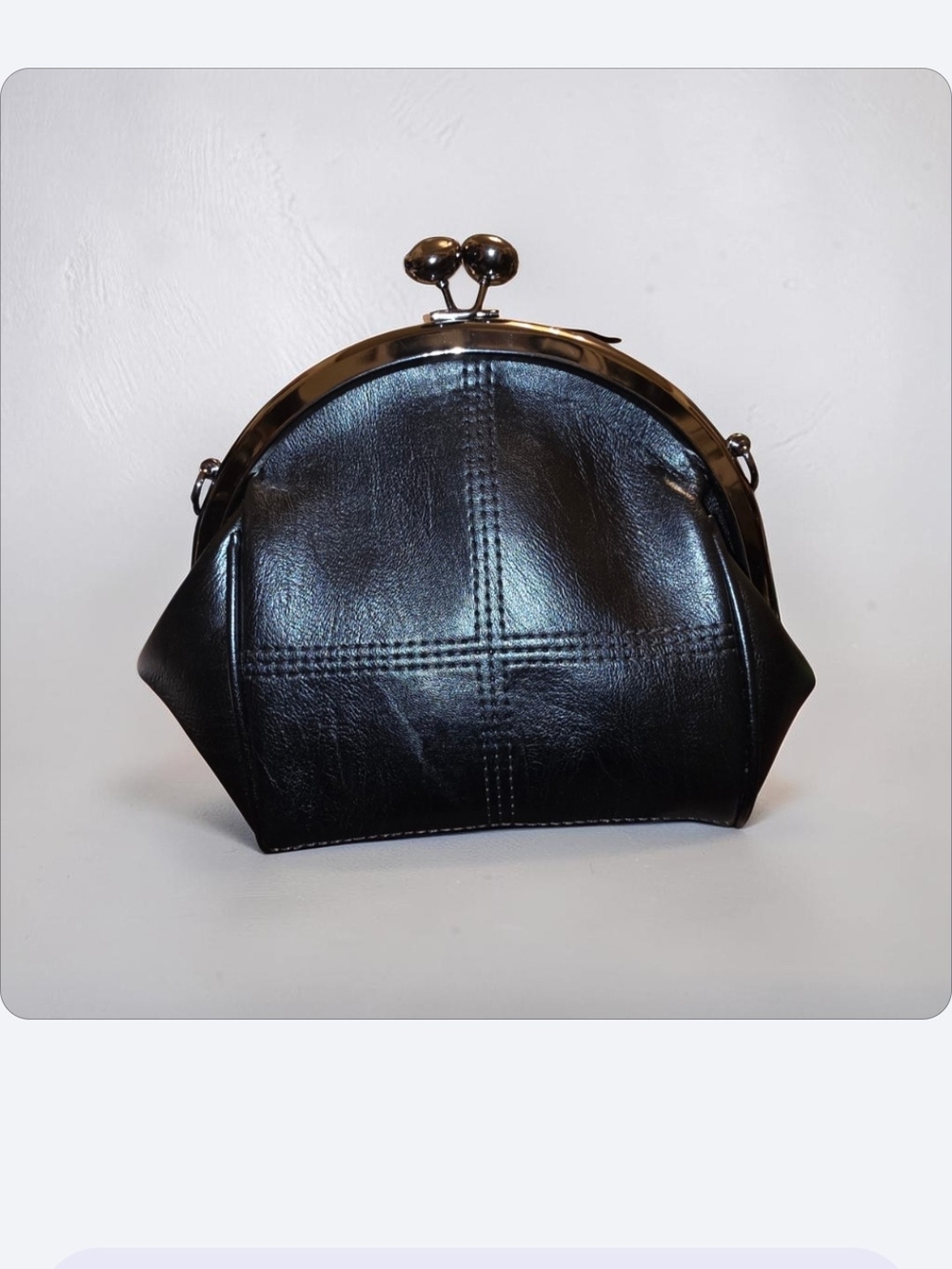 Vintage-style faux leather kiss lock crossbody purse